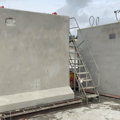 Bespoke precast concrete neutron shields in factory yard ready for delivery