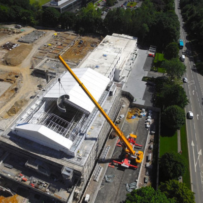 Crane installs bespoke spiral staircase into roof of Denham media centre