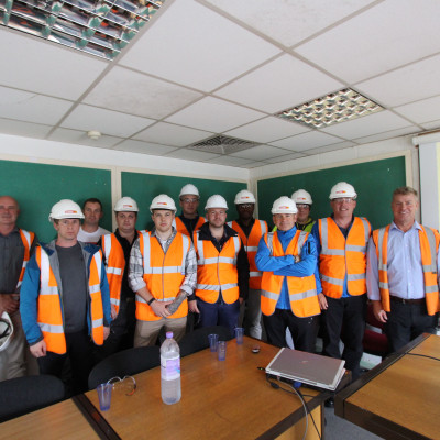 Ex-armed forces members pose with Milbank Operations and Health and Safety Managers