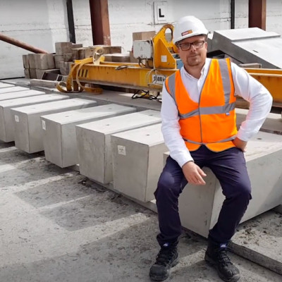 Mark Ellis sits on bespoke precast concrete seating units