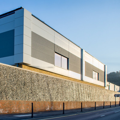 Flint embossed bespoke retaining walls installed at Dover retail park